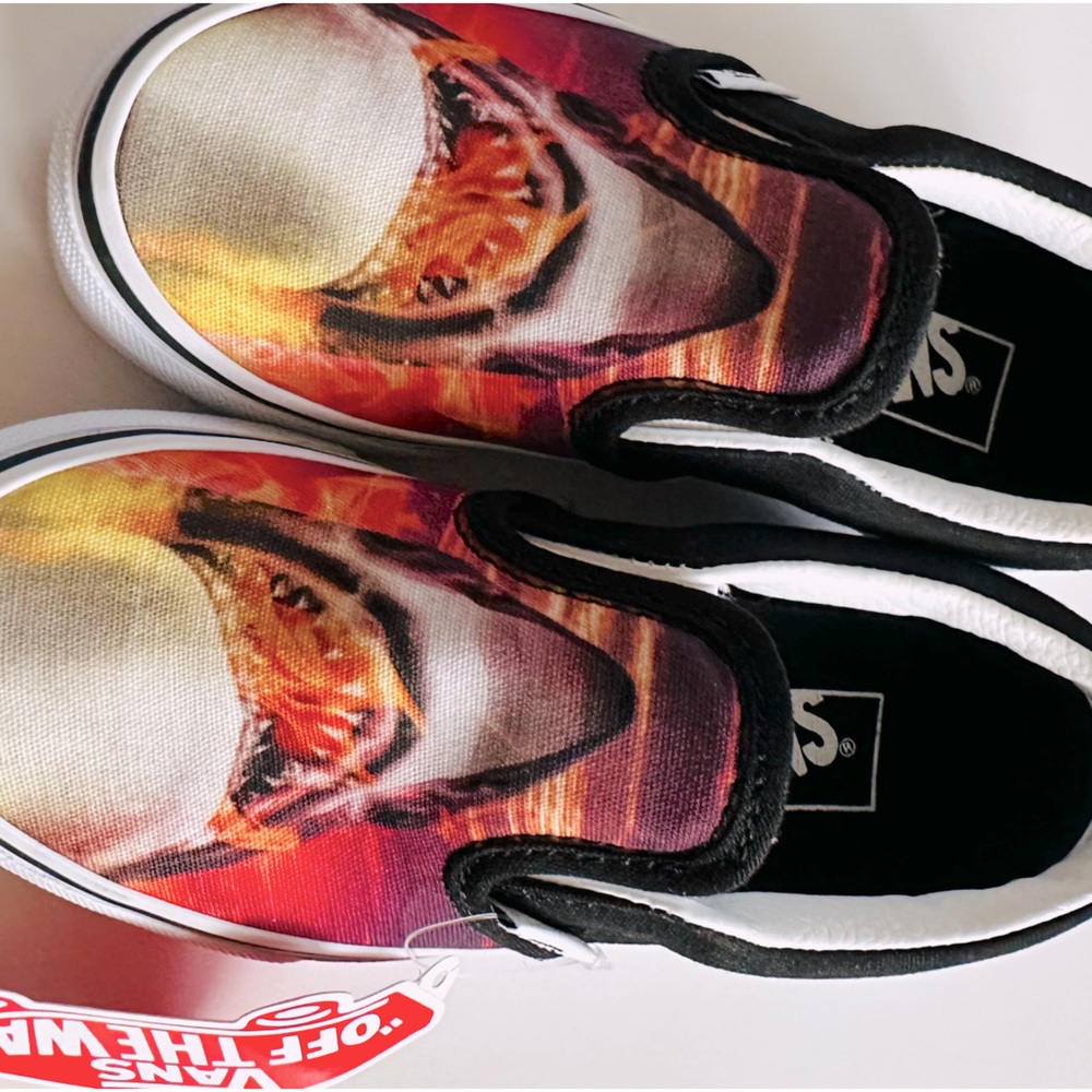 Brand new kids Vans slip-ons. Skater shoes with a flaming shark. Size 11.5